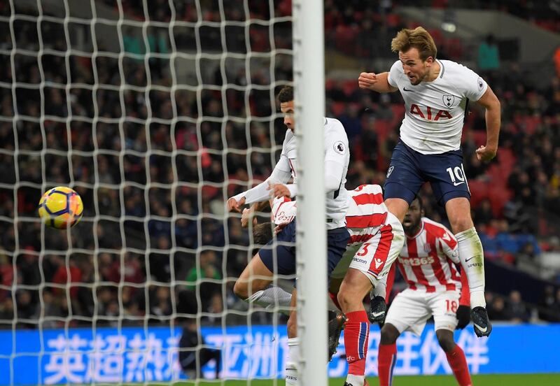 Soccer Football - Premier League - Tottenham Hotspur vs Stoke City - Wembley Stadium, London, Britain - December 9, 2017   Tottenham's Harry Kane scores their third goal       REUTERS/Toby Melville    EDITORIAL USE ONLY. No use with unauthorized audio, video, data, fixture lists, club/league logos or "live" services. Online in-match use limited to 75 images, no video emulation. No use in betting, games or single club/league/player publications. Please contact your account representative for further details.