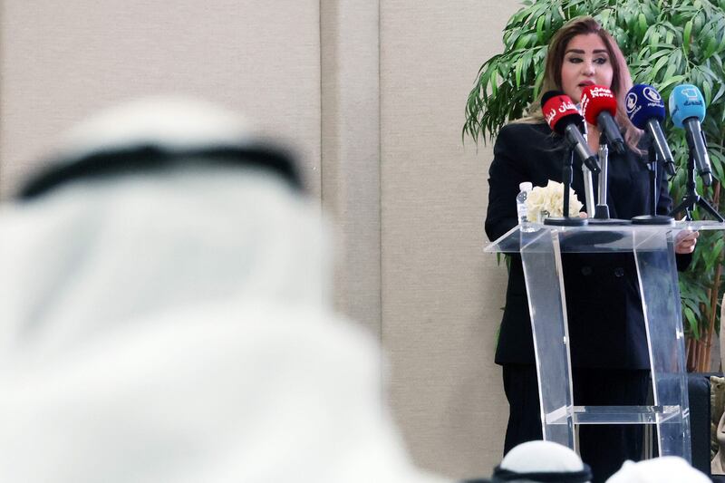 Candidate Salwa Al Saeid speaks at the Women's Cultural Society in Kuwait City. AFP