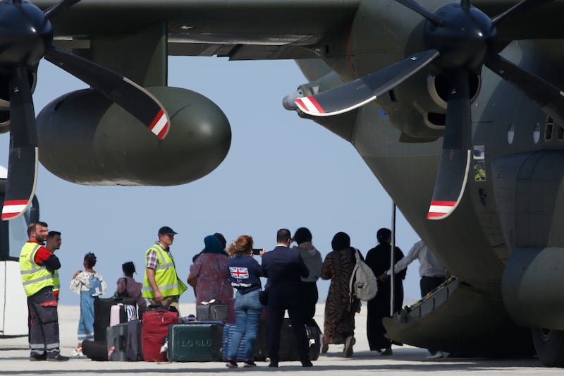 British citizens from Sudan leave an RAF aircraft at Larnaca International Airport in Cyprus on April 26. Getty