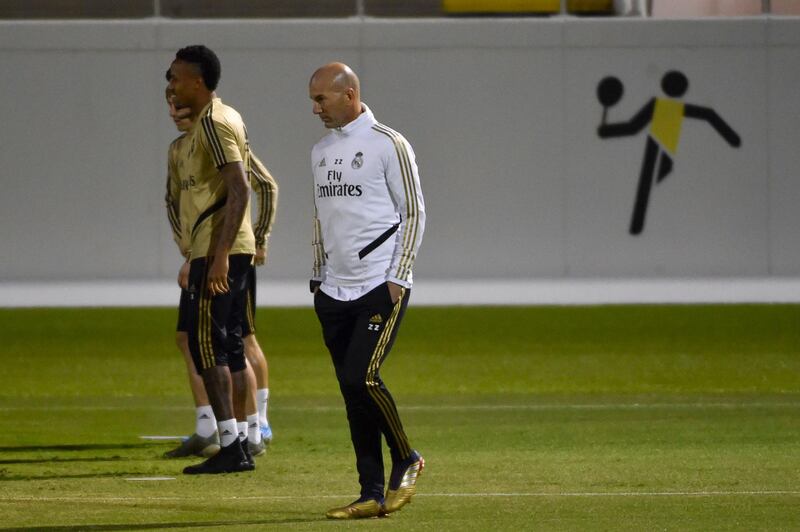 Zinedine Zidane keeps an eye on Real Madrid's training session. AFP