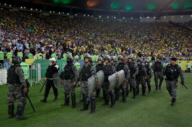 Members of the Brazilian police stand by after a clash between fans prior to a 2026 World Cup qualifiers match between Brazil and Argentina at Maracana stadium in Rio de Janeiro, Brazil on November 21, 2023.   EPA