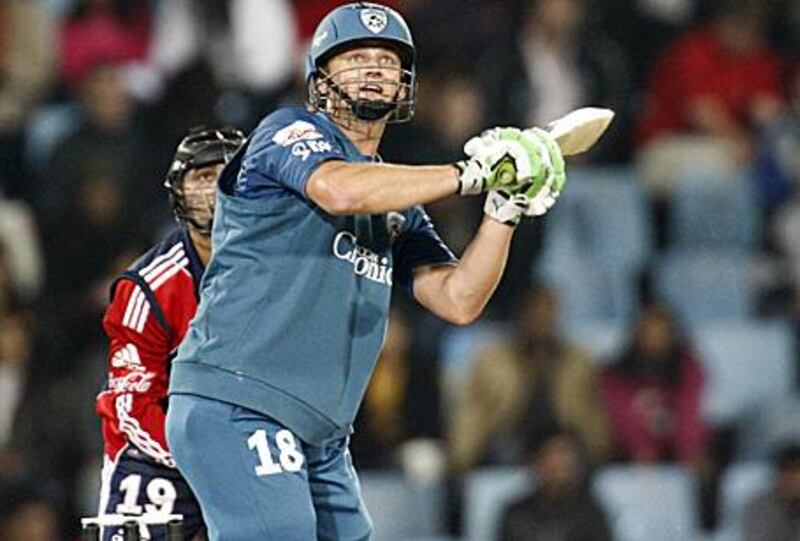 Adam Gilchrist, the Deccan Chargers captain, plays a flick shot for an effortless boundary against the Delhi Daredevils during his remarkable knock of 85 from just 35 balls.