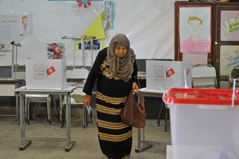 A voter casts her ballot in Ben Arous region. AFP