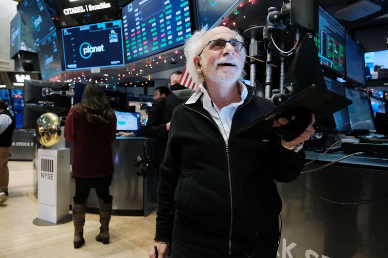 Traders work on the floor of the New York Stock Exchange. The blue-chip S&P 500 index recently closed at a record high after a rise in US inflation fell short of the market’s worst-case forecasts. AFP