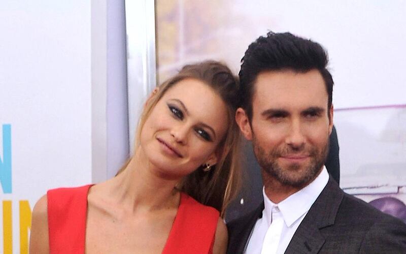 The model Behati Prinsloo and the musician Adam Levine. Stephen Lovekin / Getty Images for The Weinstein Company / AFP