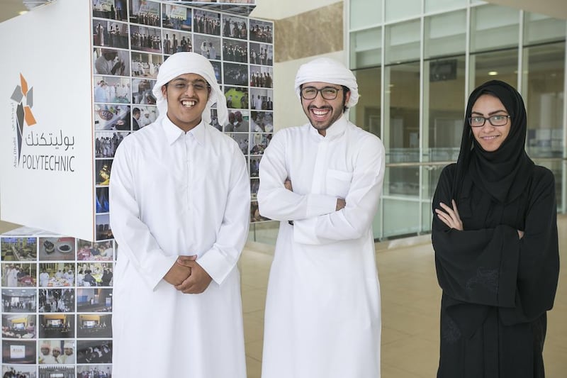 Left to right, Abdulaziz Hashim and Abdelrahman Al Khamiri are set to graduate as nuclear specialists, while Muna Al Suwaidi will be going to South Korea for on-the-job training in October. Mona Al Marzooqi / The National  