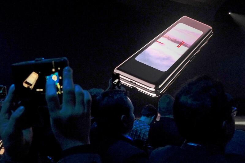 The Samsung Galaxy Fold phone is shown on a screen at Samsung’s Unpacked event in San Francisco. Reuters