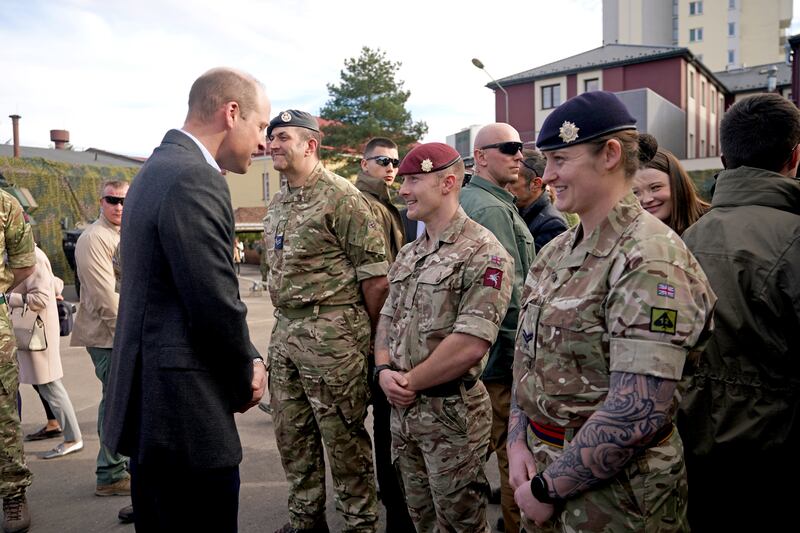 Prince William meets members of the British military. Getty