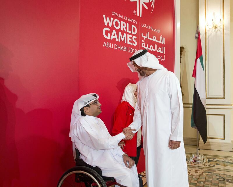 ABU DHABI, UNITED ARAB EMIRATES - January 23, 2017: HH Sheikh Mohamed bin Zayed Al Nahyan, Crown Prince of Abu Dhabi and Deputy Supreme Commander of the UAE Armed Forces (R) greets Majid Al Usaimi, National Director of the Special Olympics UAE (L) during an MOU signing ceremony at Sea Palace. 
( Mohamed Al Hammadi / Crown Prince Court - Abu Dhabi )
---