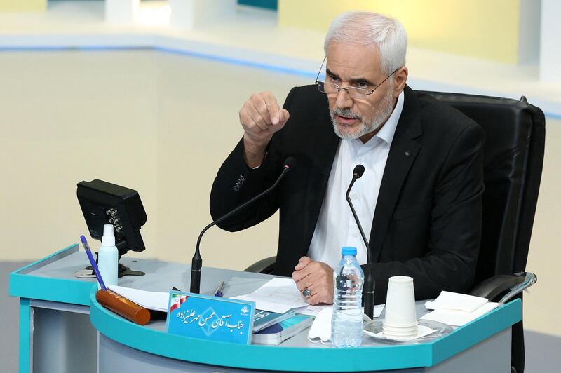 Iranian presidential candidate Mohsen Mehralizadeh during the first televised debate between Iran presidential candidates. AFP PHOTO /Iranian Young Journalist Club