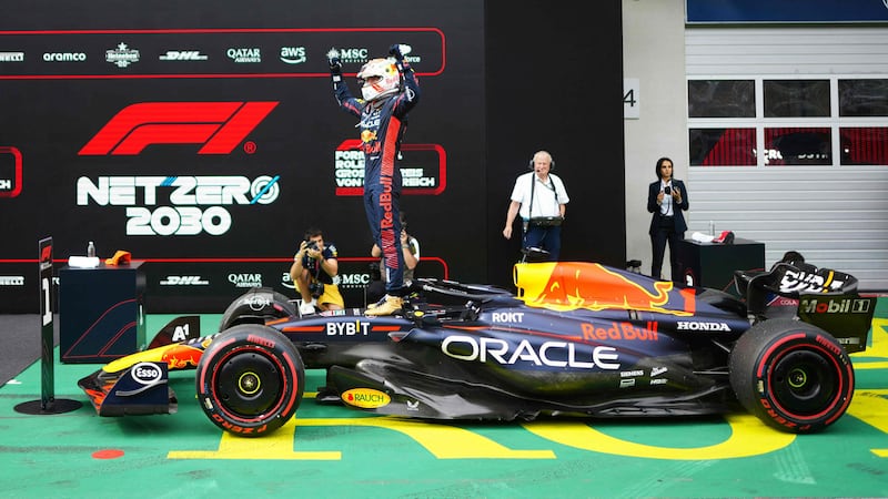 Red Bull driver Max Verstappen celebrates after the race. AFP