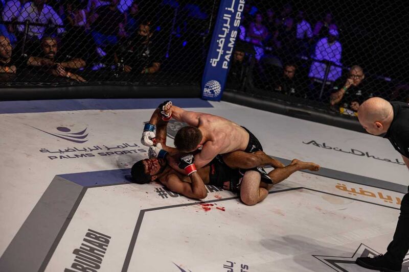 Mohammad Qwai Abzakh lands a blow at Hadi Omar Al Hussaini. 