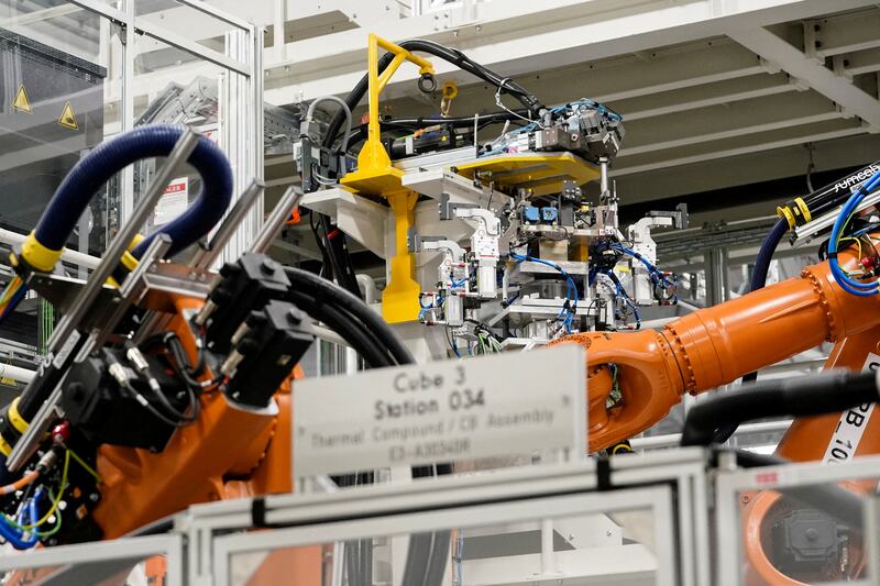 Machines on a battery tray assembly line at a Mercedes-Benz electric vehicle Battery Factory. The price of electric car batteries had plateaued rather than falling since 2003. Reuters