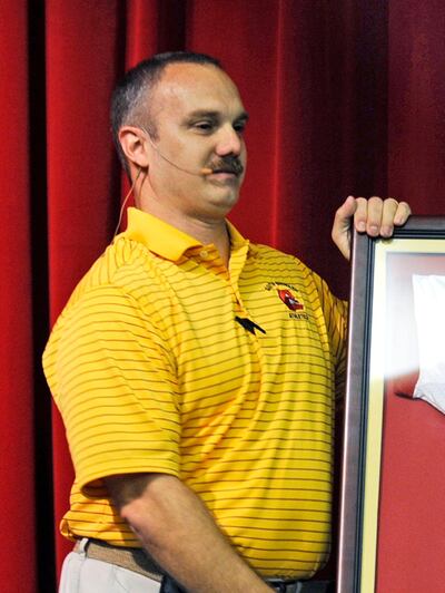 This undated photo shows Chris Hixon, the athletic director at Marjory Stoneman Douglas High School in Parkland, Fla. Hixon was killed when former student Nikolas Cruz opened fire at the school on Wednesday, Feb. 14, 2018. (Susan Stocker/South Florida Sun-Sentinel via AP)