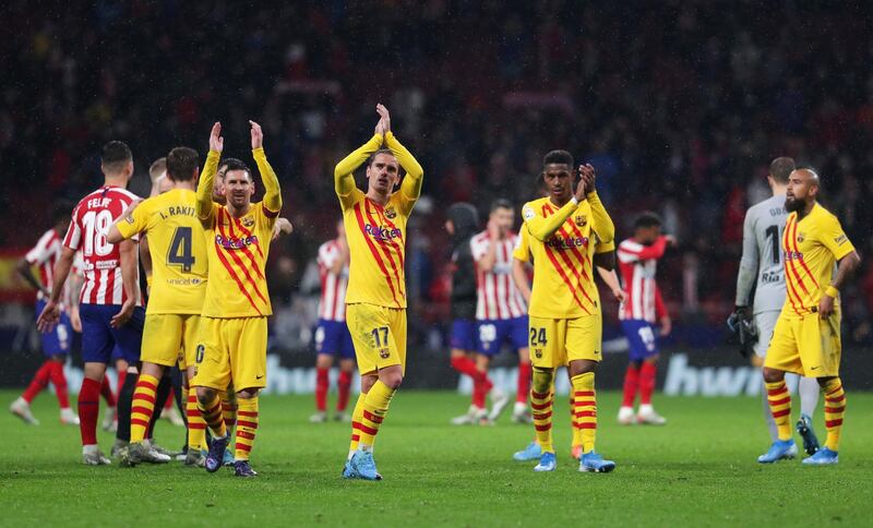 Lionel Messi, Antoine Griezmann and Junior Firpo of FC Barcelona celebrate victory. Getty