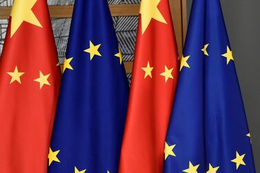 EU and Chinese flags at the Europa building in Brussels. AP Photo
