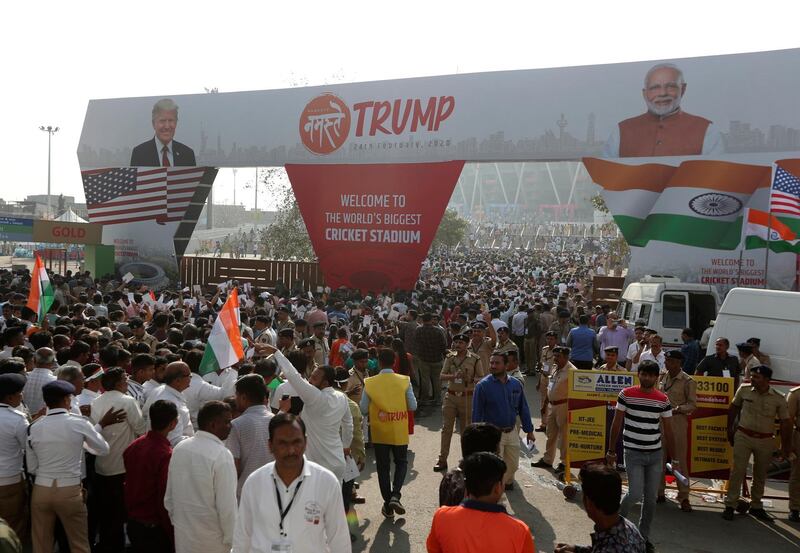 Indians line up at the entrance to enter the Sardar Patel stadium to attend the Namaste Trump event in Ahmedabad, India. AP Photo