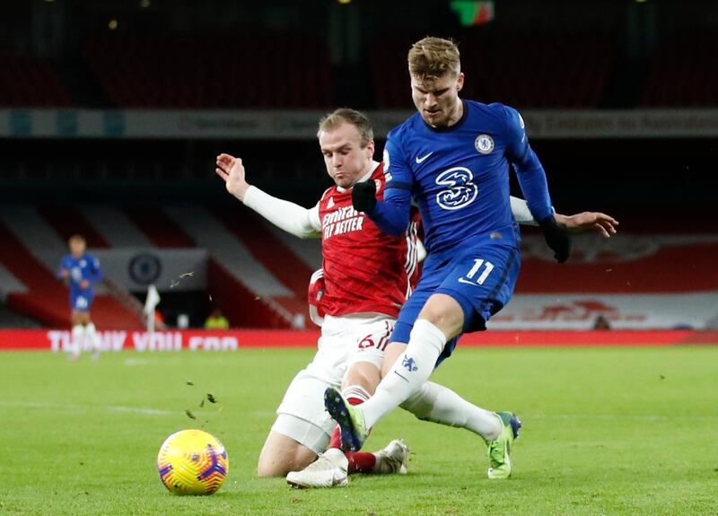 Chelsea attacker Timo Werner - challenged here by Arsenal's Rob Holding - was taken off at half-time by manager Frank Lampard. Reuters