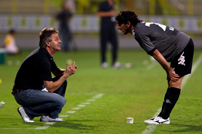 Dubai, United Arab Emirates, October 28, 2012:   Al Dhafra's head coach Dzemal Hadziabdic, left, speaks with Saif Mohamed during the seond half of their Pro League match against Al Wasl at Zabeel Stadium in Dubai on October 28, 2012. Christopher Pike / The National