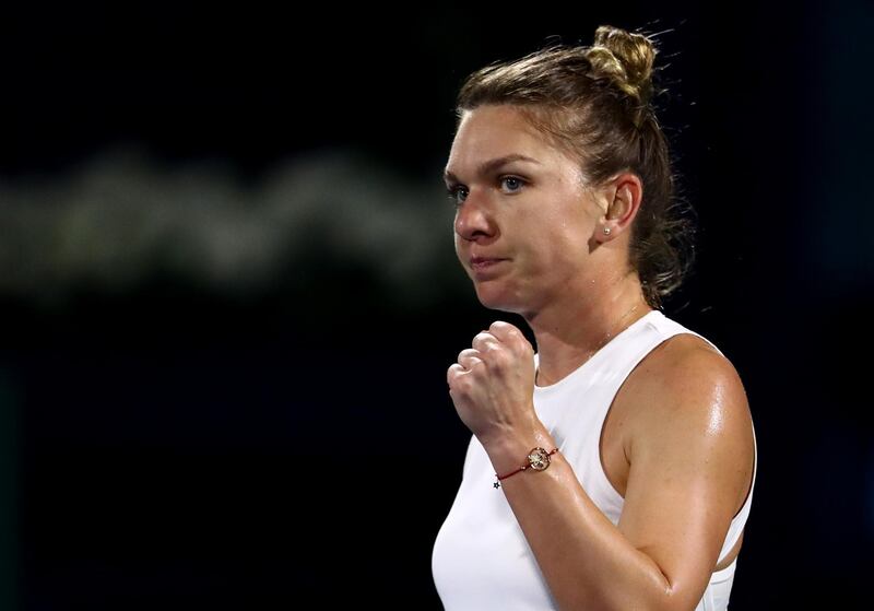 DUBAI, UNITED ARAB EMIRATES - FEBRUARY 21:  Simona Halep of Romania reacts against Jennifer Brady of USA during  the women's singles  semi final match on Day Five of the Dubai Duty Free Tennis at Dubai Duty Free Tennis Stadium on February 21, 2020 in Dubai, United Arab Emirates. (Photo by Francois Nel/Getty Images)