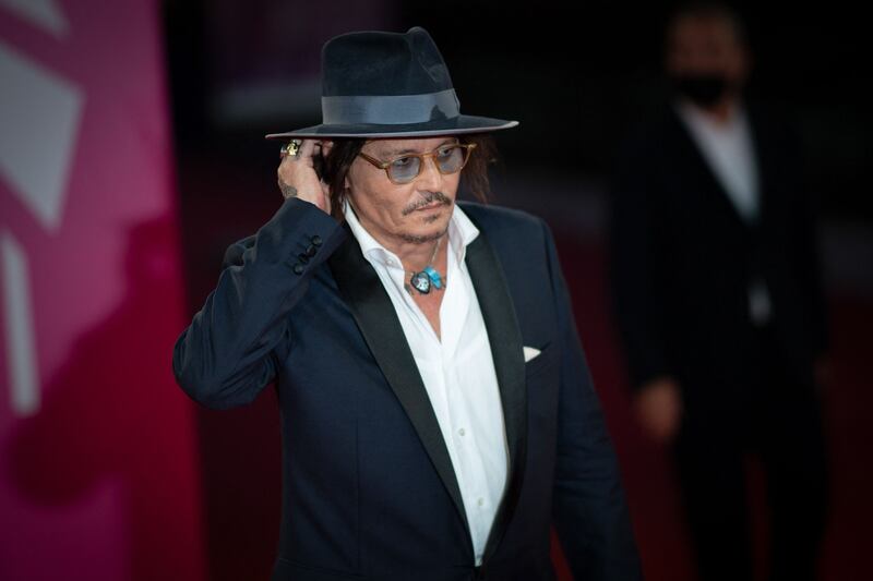 US actor Johnny Depp arrives on the red carpet of the 47th Deauville US Film Festival in Deauville, France, on September 5, 2021. AFP