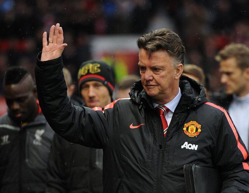 Manchester United manager Louis van Gaal reacts during his side's 3-0 victory against Liverpool in the Premier League at Old Trafford on Sunday. Peter Powell / EPA / December 14, 2014  