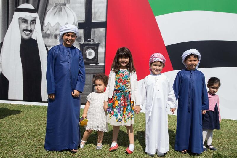 The grandchildren of the late Khalifa Al Mubarak stand for a photograph during a street renaming ceremony in his honor. From left Mustafa, Lulwa, Sarya, Khalifa, Khaled and Alyazia. Silvia Razgova / Crown Prince Court - Abu Dhabi