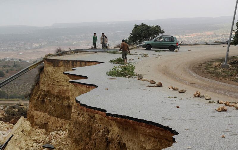 A road in Shahat badly damaged by the storm. Reuters