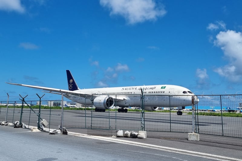 A Saudia airline Boeing 787 Dreamliner bound for Singapore and carrying Sri Lanka's fleeing president Gotabaya Rajapaksa, his wife and bodyguards prepares to take off at the Velana International airport, in the Maldives. AFP