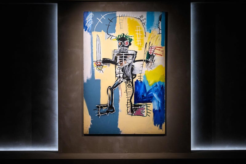 US artist Jean-Michel Basquiat's 1982 painting, 'Warrior' is seen displayed at the Christies auction house showroom in Hong Kong on March 22, 2021, which is estimated at between 240,000,000 - 320,000,000 HKD (31,000,000 - 41,000,000 USD), and will be auctioned in a livestreamed, single-lot evening sale entitled 'We Are All Warriors - The Basquiat Auction', as part of Christie's Spring Season of 20th Century sales.  RESTRICTED TO EDITORIAL USE - MANDATORY MENTION OF THE ARTIST UPON PUBLICATION - TO ILLUSTRATE THE EVENT AS SPECIFIED IN THE CAPTION
 / AFP / Anthony WALLACE / RESTRICTED TO EDITORIAL USE - MANDATORY MENTION OF THE ARTIST UPON PUBLICATION - TO ILLUSTRATE THE EVENT AS SPECIFIED IN THE CAPTION
