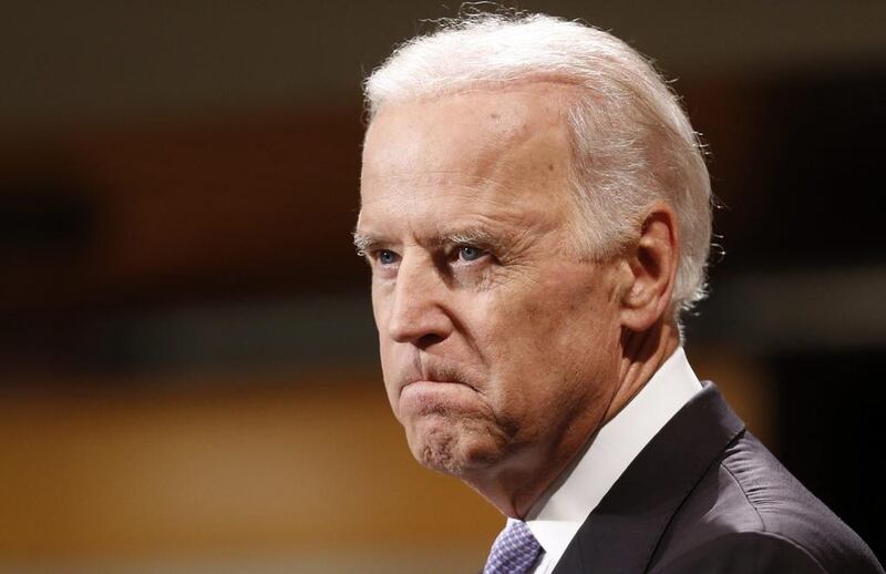 US vice president Joe Biden bites his lip while speaking to students faculty and staff at Harvard University’s Kennedy School of Government in Cambridge, Massachusetts on Thursday, October 2, 2014. Winslow Townson / AP Photo