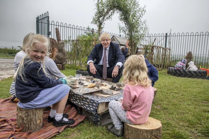WADEBRIDGE, ENGLAND - JUNE 10: Prime Minister Boris Johnson visits the out door spaces to discuss environmental issues at the St Issey Primary school on June 10, 2021 near Wadebridge in Cornwall. UK Prime Minister, Boris Johnson, will host leaders from USA, Japan, Germany, France, Italy and Canada at the G7 Summit to be held in Carbis Bay, Cornwall - beginning Friday, June 11. This year the UK has invited India, South Africa, and South Korea to attend the Leaders' Summit as guest countries as well as the EU. (Photo by Jack Hill - WPA Pool/Getty Images)