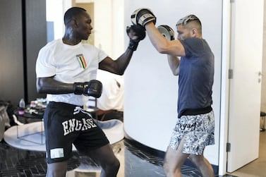 UFC middleweight champion Israel Adesanya training in his hotel room in Abu Dhabi ahead of his title defence against Paulo Costa at UFC 253, which opens Fight Island 2 in the capital on Sept 27. Credit: Jeff Sainlar - EMG