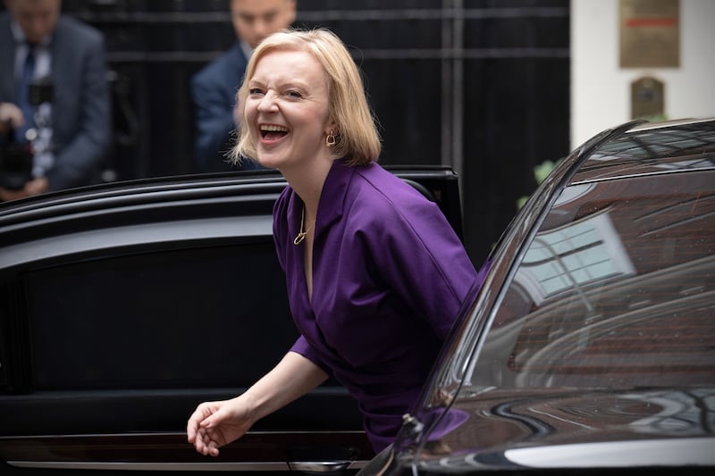 New Conservative Party leader and incoming prime minister Liz Truss arrives at the party headquarters in London on Monday. Getty