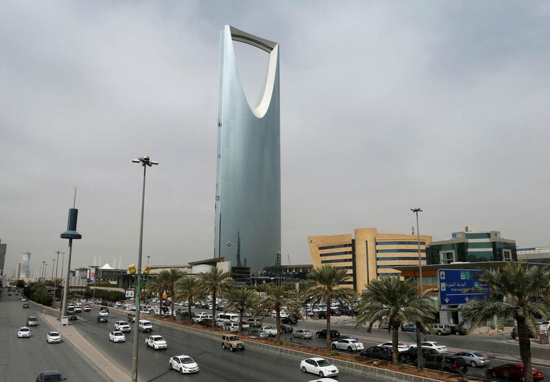 FILE PHOTO: Cars drive past the Kingdom Centre Tower in Riyadh, Saudi Arabia, January 30, 2018. REUTERS/Faisal Al Nasser/File Photo