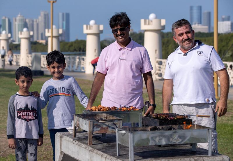 Abu Dhabi, United Arab Emirates, December 13, 2019.  
  -- The Cheema Family and El Kakoun family enjoy a barbeque together at the Dolphin Park, Eastern Mangrove.
Victor Besa/The National
Section:  NA
Reporter: