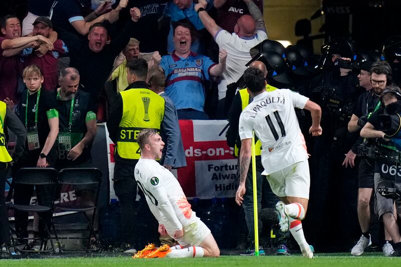 West Ham's Jarrod Bowen, left, celebrates after scoring the winning goal. AP 