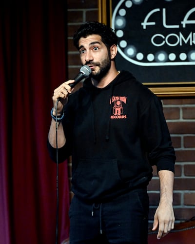 Comedian Paul Elia performing in Burbank, California, in 2022. Getty Images