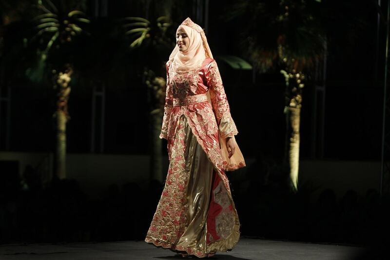 The collections showed a blend of traditional Palestinian embroidery and modern designs. AFP