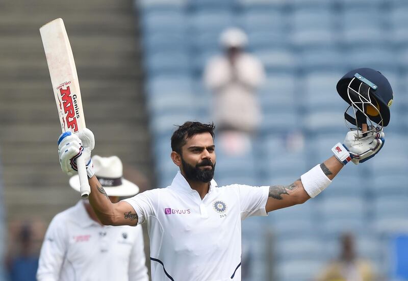 India's cricket team captain Virat Kohli celebrates after scoring a century. AFP