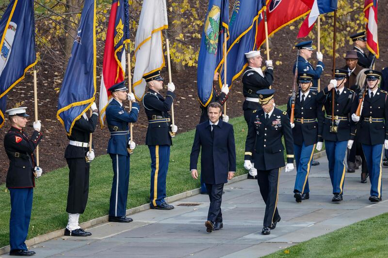 Mr Macron arrives for a wreath-laying ceremony at the Tomb of the Unknown Soldier while visiting Arlington National Cemetery in Arlington, Virginia. AFP