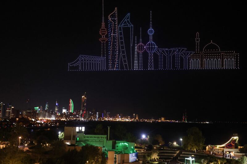 Kuwait City's skyline hovers above the city in this drone image