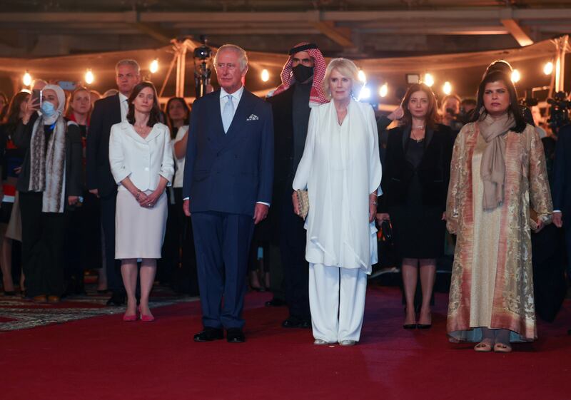 Prince Charles and Camilla are welcomed to the centenary celebration. Reuters