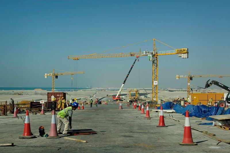 25/04/09 - Abu Dhabi, UAE -   Construction workers recently finished one lane of Saadiyat Bridge connecting Abu Dhabi to Saadiyat Island.  (Andrew Henderson/The National) *** Local Caption ***  ah_090424_Saadiyat_Bridge_0064.jpg