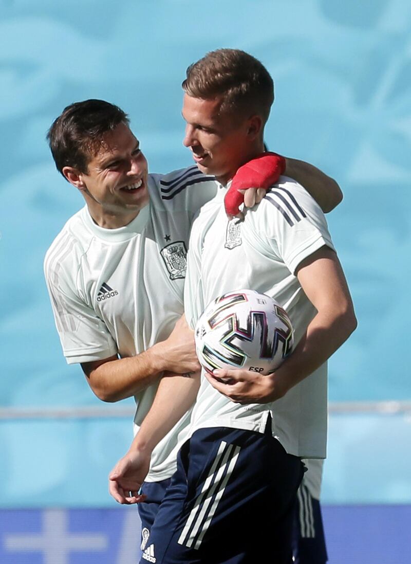 Dani Olmo (R) and Cesar Azpilicueta during a training session in Seville. EPA