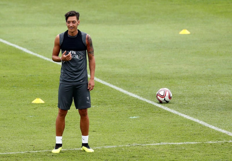 Ozil attends a training session. Reuters