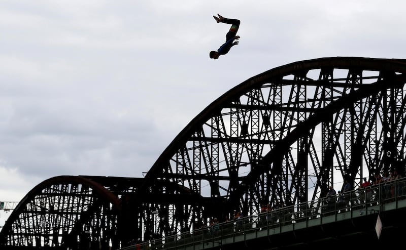 A participant jumps into the Vltava river during a high diving competition in Prague, Czech Republic, on Saturday, August 22. Reuters