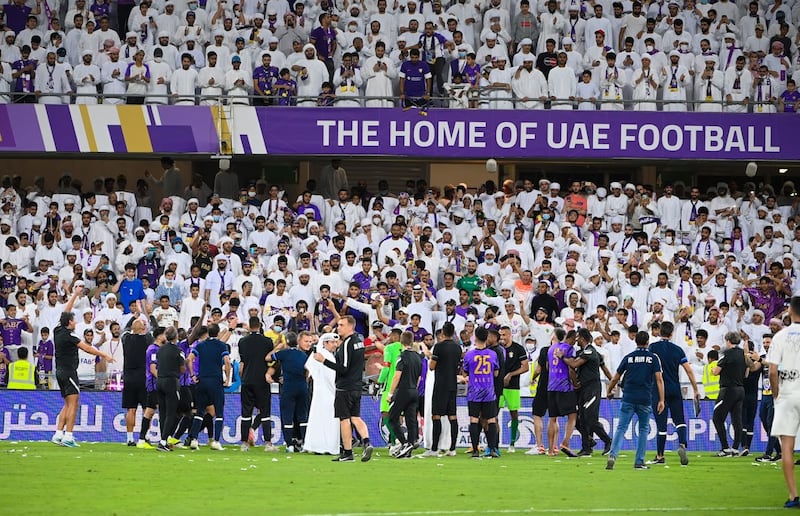 Al Ain players salute the fans after defeating Al Jazira 5-0.