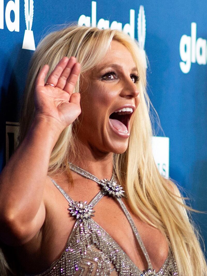 (FILES) In this file photo Singer Britney Spears attends the 29th Annual GLAAD Media Awards at the Beverly Hilton on April 12, 2018 in Beverly Hills, California. After more than a decade living under a conservatorship that sees her father steer her personal and professional matters, Britney Spears is seeking to significantly alter the terms of the arrangement.Since her infamous series of public meltdowns in 2008, the pop star Spears, 38, has lived in California according to a court-approved legal guardianship largely governed by her father, Jamie Spears. On August 18, 2020 her attorney, Samuel Ingham, filed court papers to remove her father from the conservatorship's charge, instead naming Jodi Montgomery -- a licensed professional conservator -- as its permanent head. / AFP / VALERIE MACON
