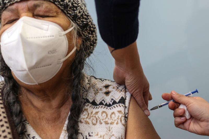 An elderly woman receives the vaccine against Covid-19 at a hospital in the state of Guanajuato, Mexico. EPA